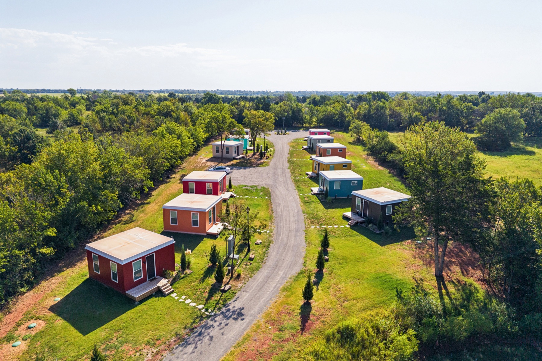 The colorful Pasadera casitas arranged across green open grounds